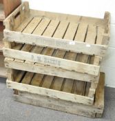 A set of six wooden apple trays