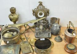 A brass lamp and other items