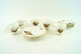 A Fenton China Company set of six cups, saucers and cake plates,