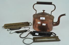 A copper kettle and a set of scales