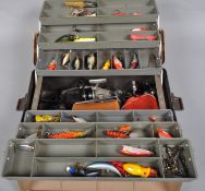 A cantilever tackle box with reels and approximately 50 plugs, spoons and other lures