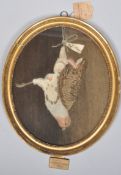 A late 18th century woolwork depicting a game bird still life set within a gilt frame,