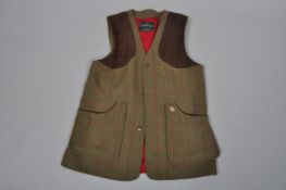 An Alan Paine shooting jacket,