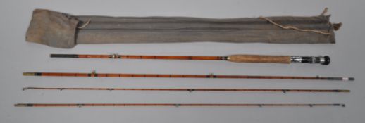 An R. Champmen & Co Quinette MK2 split cane three vsection fly rod with extra tie.