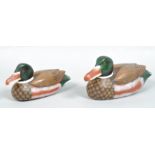 Two reproduction decoy ducks