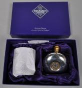 A boxed Edinburgh crystal hip flask and whisky glass set