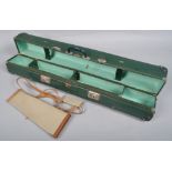 A vintage archers case and a quiver