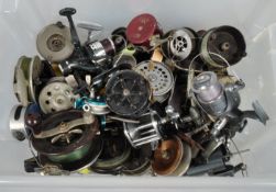 A quantity of fishing reels and spools for spares and repair