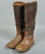 A pair of leather boots with label for J C Cording & Co Ltd