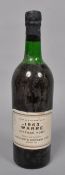 A bottle of Warres vintage port 1963