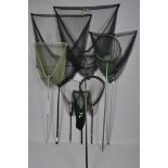 A collection of seven landing nets, including Pike,