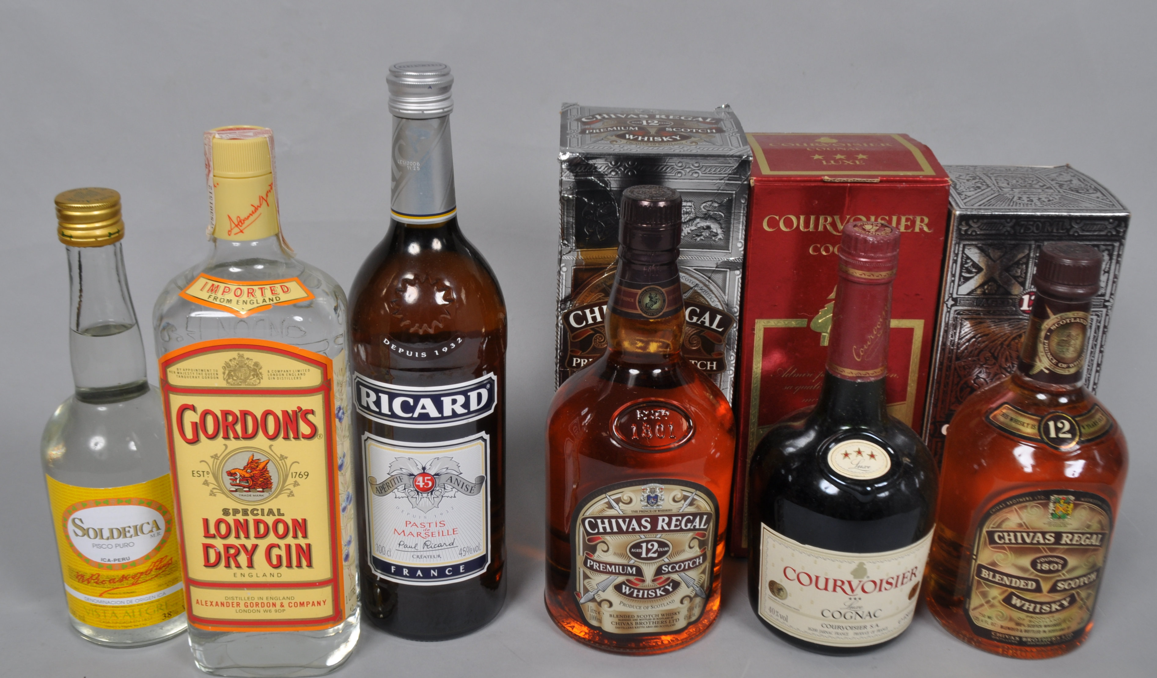 A boxed Chival Regal, aged 12 years, 1 Litre and other bottles