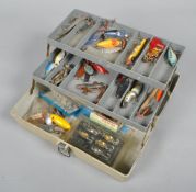 A cantilver tackle box with assorted fishing lures