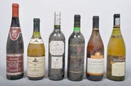 A bottle of henri La Fontaine Grand Vin de Bourgogne Chablis, 1997 and others