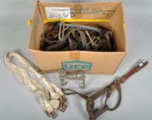 A collection of horse riding tack