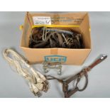 A collection of horse riding tack