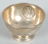 An Elkington & Co silver pedestal bowl, with a plaque of an archer and rifleman,