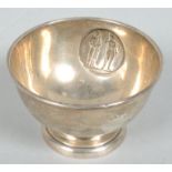 An Elkington & Co silver pedestal bowl, with a plaque of an archer and rifleman,