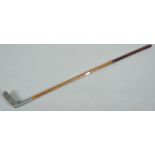 An aluminium Mills putter, hickory shaft, registered no 685349,