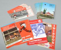 A collection of Swindon Town football programmes