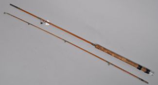 A Milwards 6'9" two piece vintage spinning rod