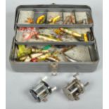 Metal cantilever tackle box containing mainly vintage north American lures,