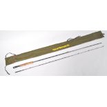 A Normark CF1022 8'6" fly rod and bag