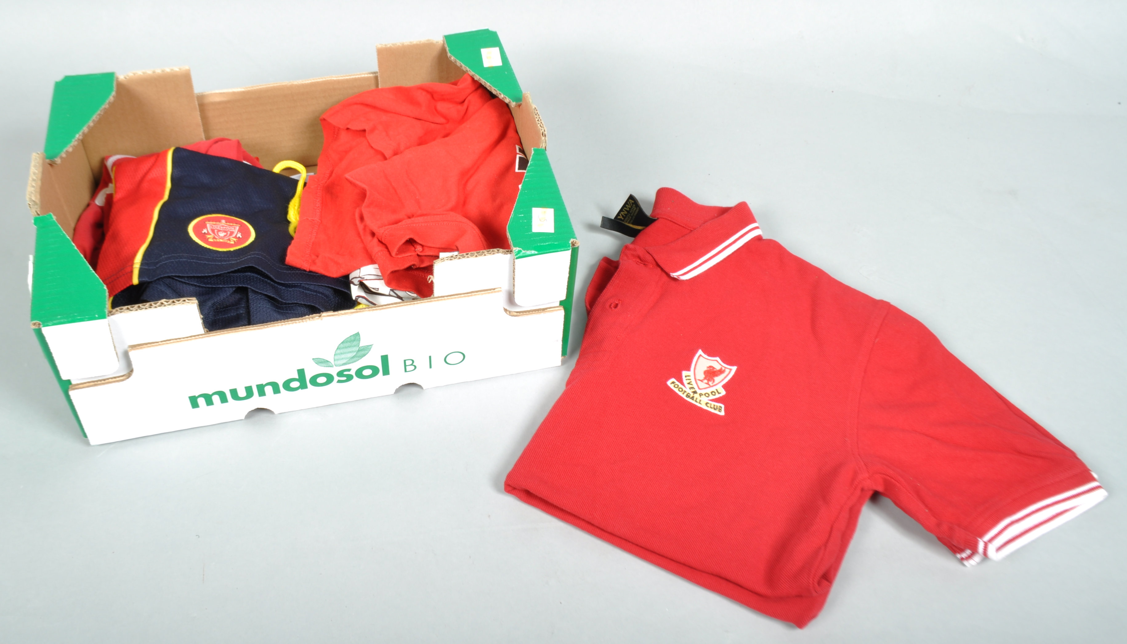 A box of Liverpool shirts/shorts/T shirts (mainly boys and youth sizes) (9 items)