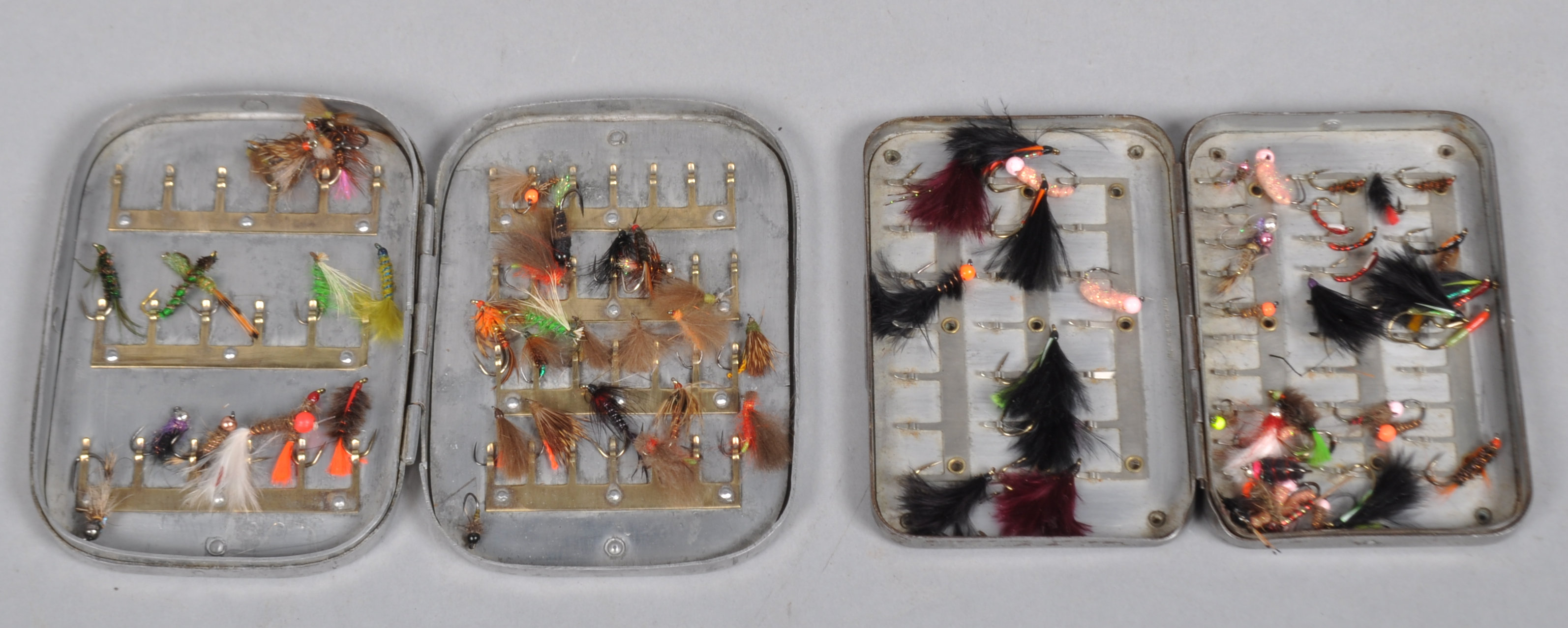 A Hardy Bros, Alnwick fly tin and an unframed fly tin containing wet flies and nymphs