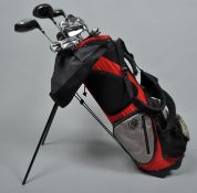 A bag of Wilson Dynapower golf clubs and Longridge putter