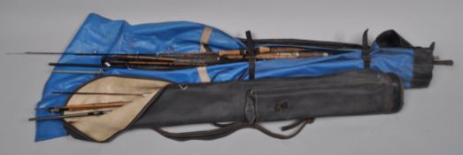 Two rod holdall's with assorted cane and glass rod parts for spares/repair