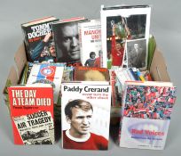 A box of Manchester United programmes, books and photos, some signed (Approx.