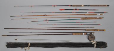 A collection of fishing rods, to include Wilkinsons special split cane fly rod,