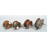 Four wooden starback centre pin fishing reels