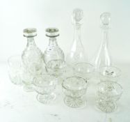 A pair of decanters and other glass