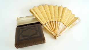 A Victorian photograph album and a mother of pearl and lace fan,