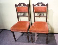A set of four chairs and two others