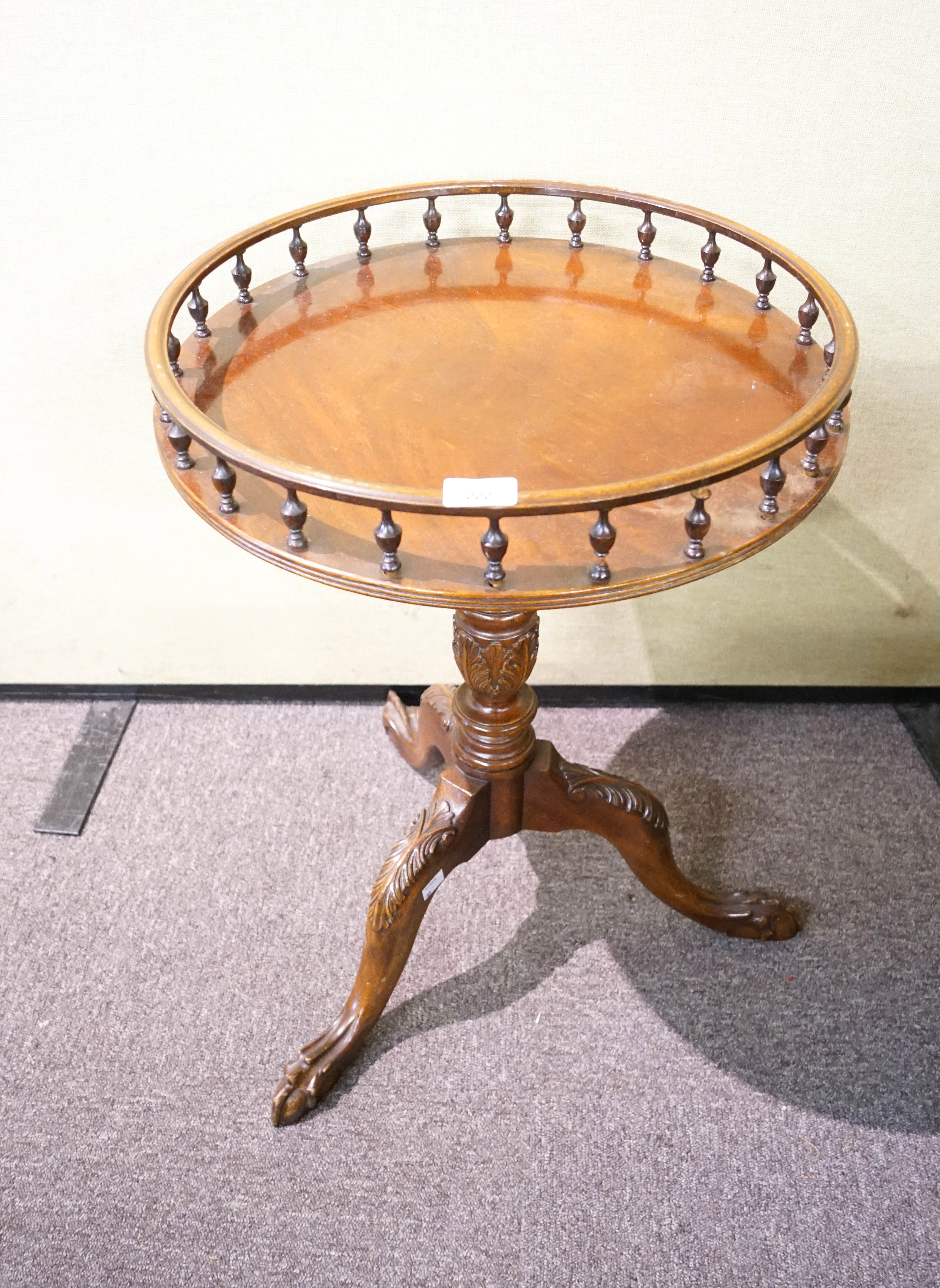 A mahogany occasional table