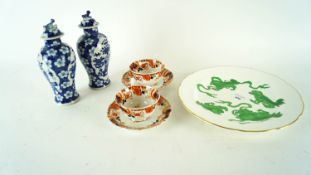 A Wedgwood 'Chinese Tigers' plate along with Royal Albert and Chinese lidded vases