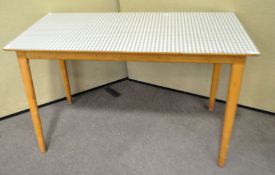 A formica top kitchen table