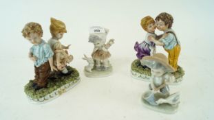 A collection of Capodimonte figure pairs along with Eve porcelain figures