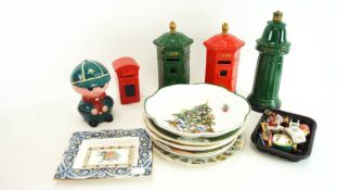 A group of money boxes and other items