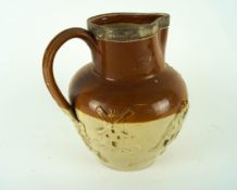 A silver mounted stoneware jug