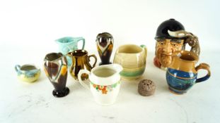 A Doulton Toby jug and others