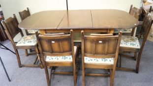 An oak dining table with leaf,