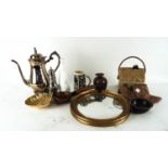A silver plated tea pot a round mirror and other items