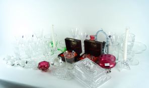 A box of assorted crystal glasses to include candle holders