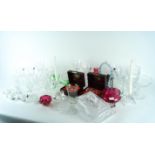 A box of assorted crystal glasses to include candle holders