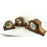 Three wood Deco mantel clocks