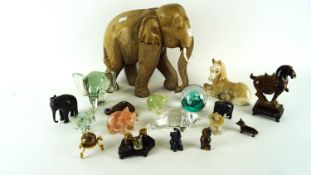 A quantity of figures of elephants and other items